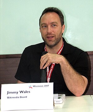Jimmy Wales (left) during Wikimania press conf…